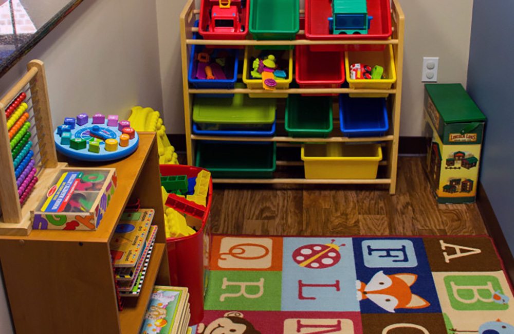 Kids waiting area with games and toys to keep children occupied while waiting for their appointments. 