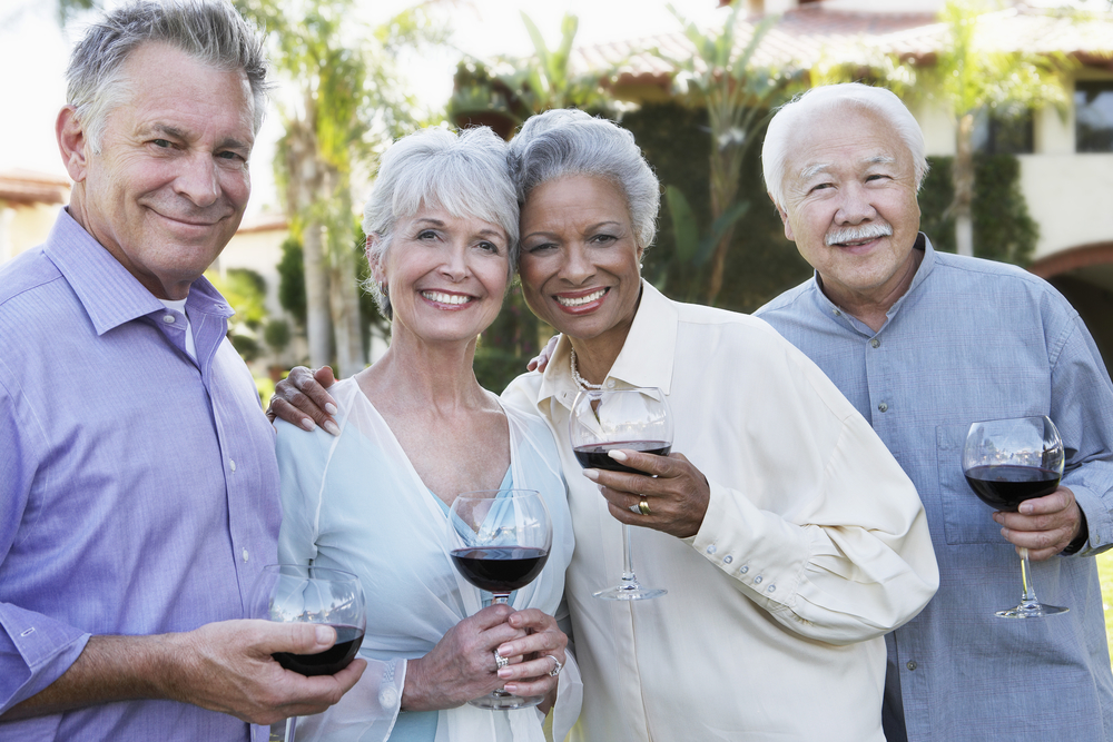 Friends Drinking Wine and toasting the good luck that Cigno Family Dental in Greenfield, WI has oral surgery services.