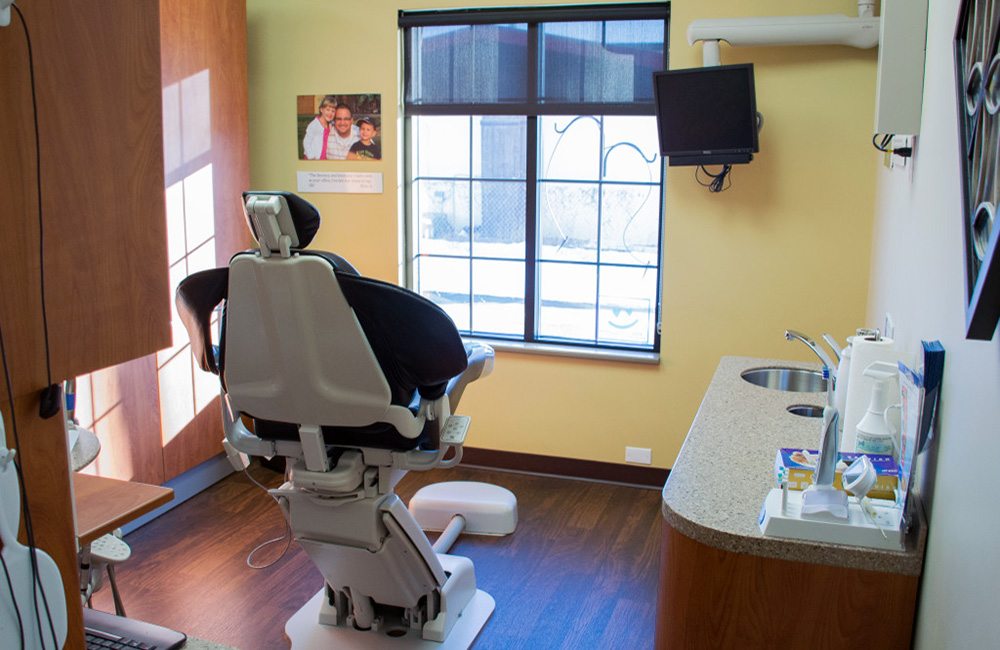View of a treatment suite where patients receive dental services for their oral health at Cigno Family Dental in Greenfield, WI. 